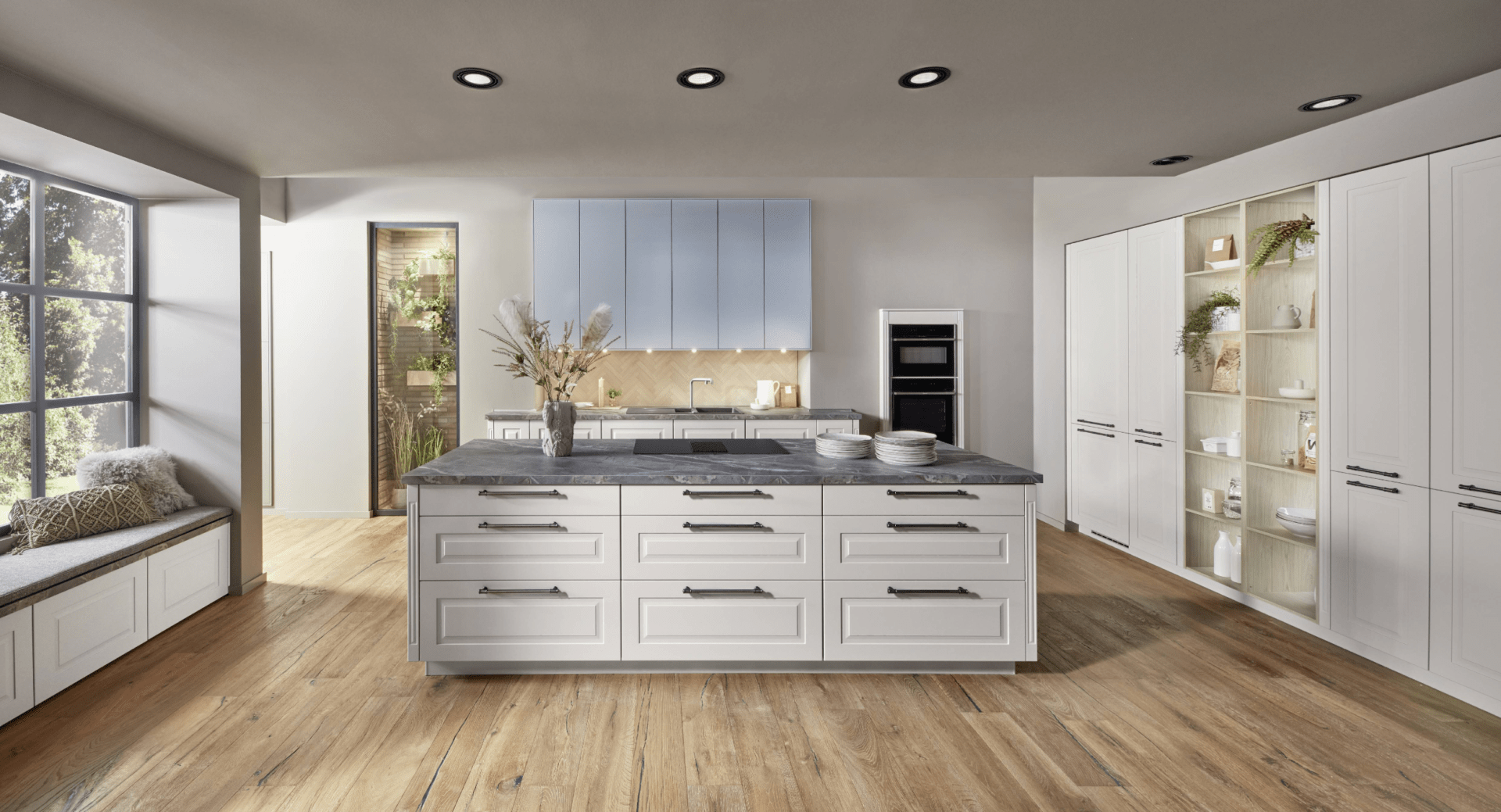 Nobilia Inselküche im modernen Landhausstil in Schilfgrün mit minimalistischen Hängeschränken und integrierter LED-Beleuchtung.